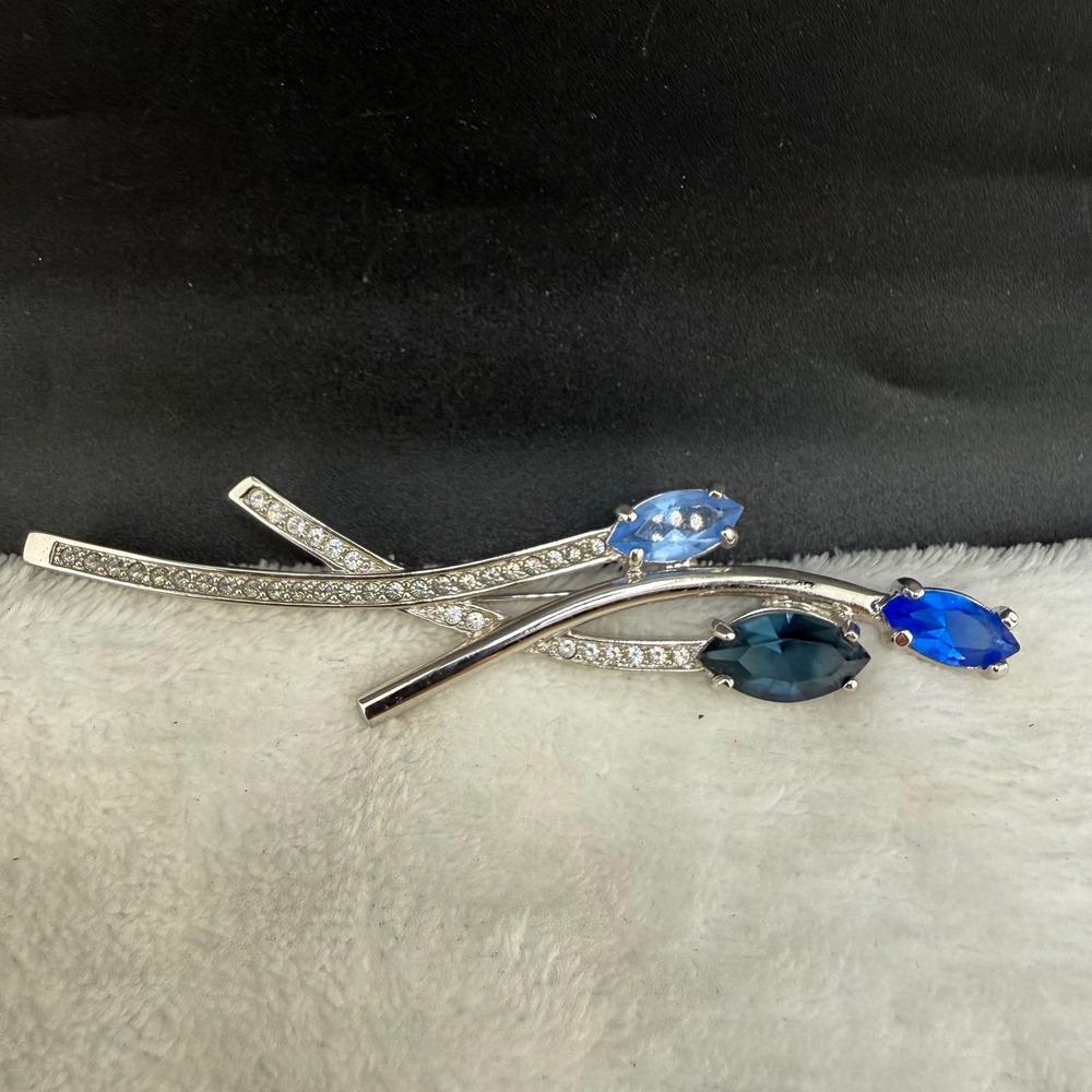 Vintage Rhinestone Brooch Silver Tone Blue Marquise Crystal Floral Spray